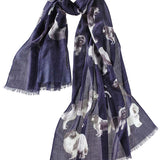 Alpine Cashmere's Dog's Life Scarf, featuring an illustrated print of dogs, in navy blue