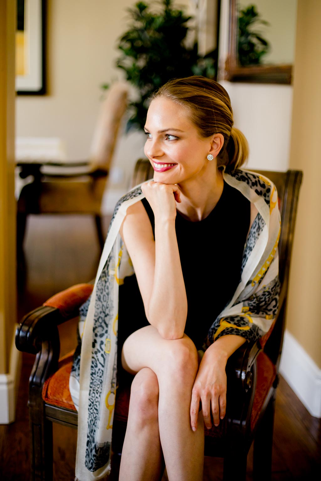 Model Wearing Alpine Cashmere Leopardo Scarf in Gold