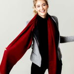 Model Wearing Alpine Cashmere Ripple Finish Scarf in Cherry Red
