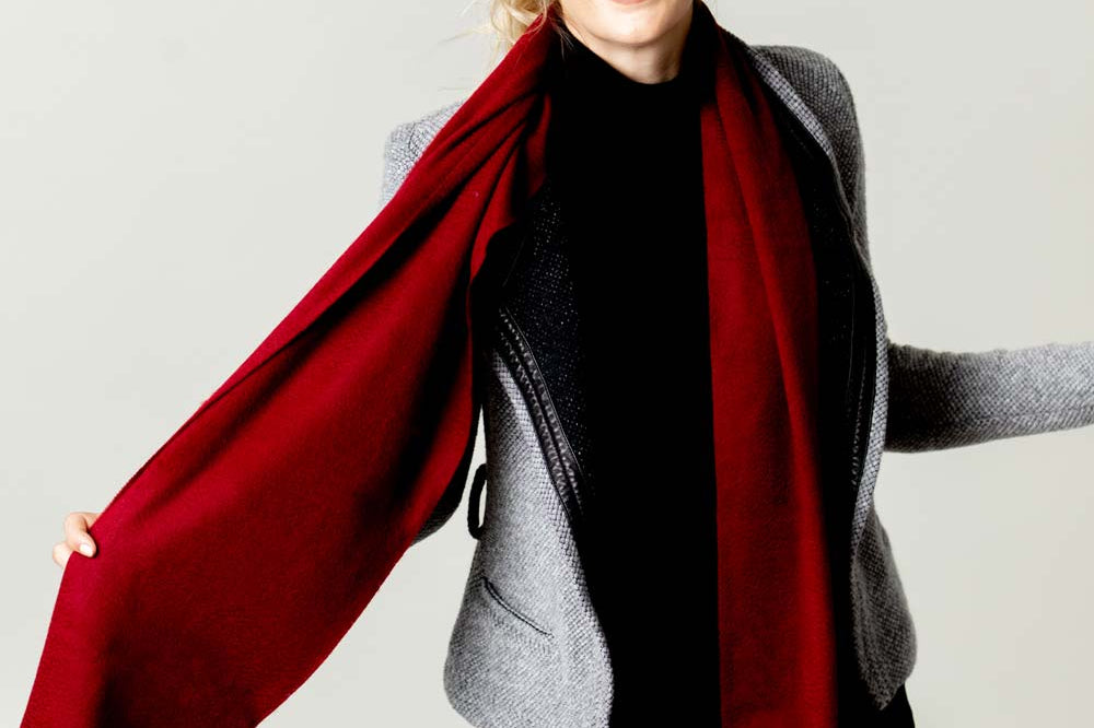 Model Wearing Alpine Cashmere Ripple Finish Scarf in Cherry Red
