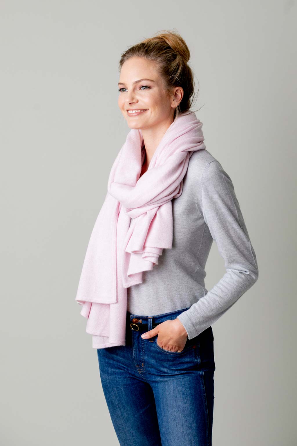 Model Wearing Alpine Cashmere's Luxurious Chunky Travel Wrap in Ballet Pink