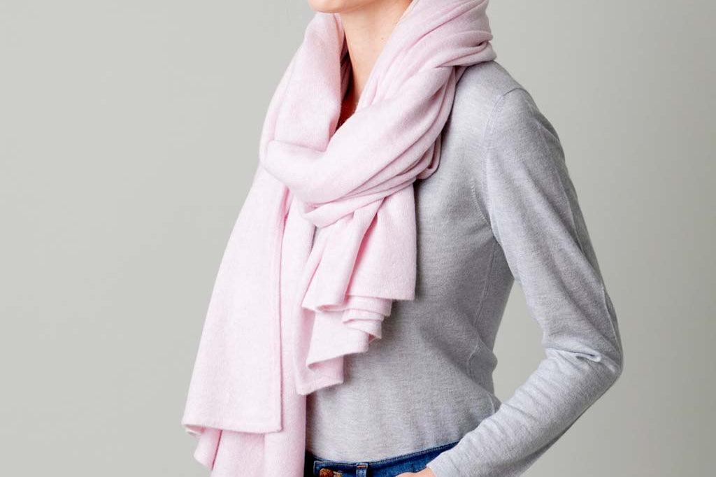 Model Wearing Alpine Cashmere's Luxurious Chunky Travel Wrap in Ballet Pink