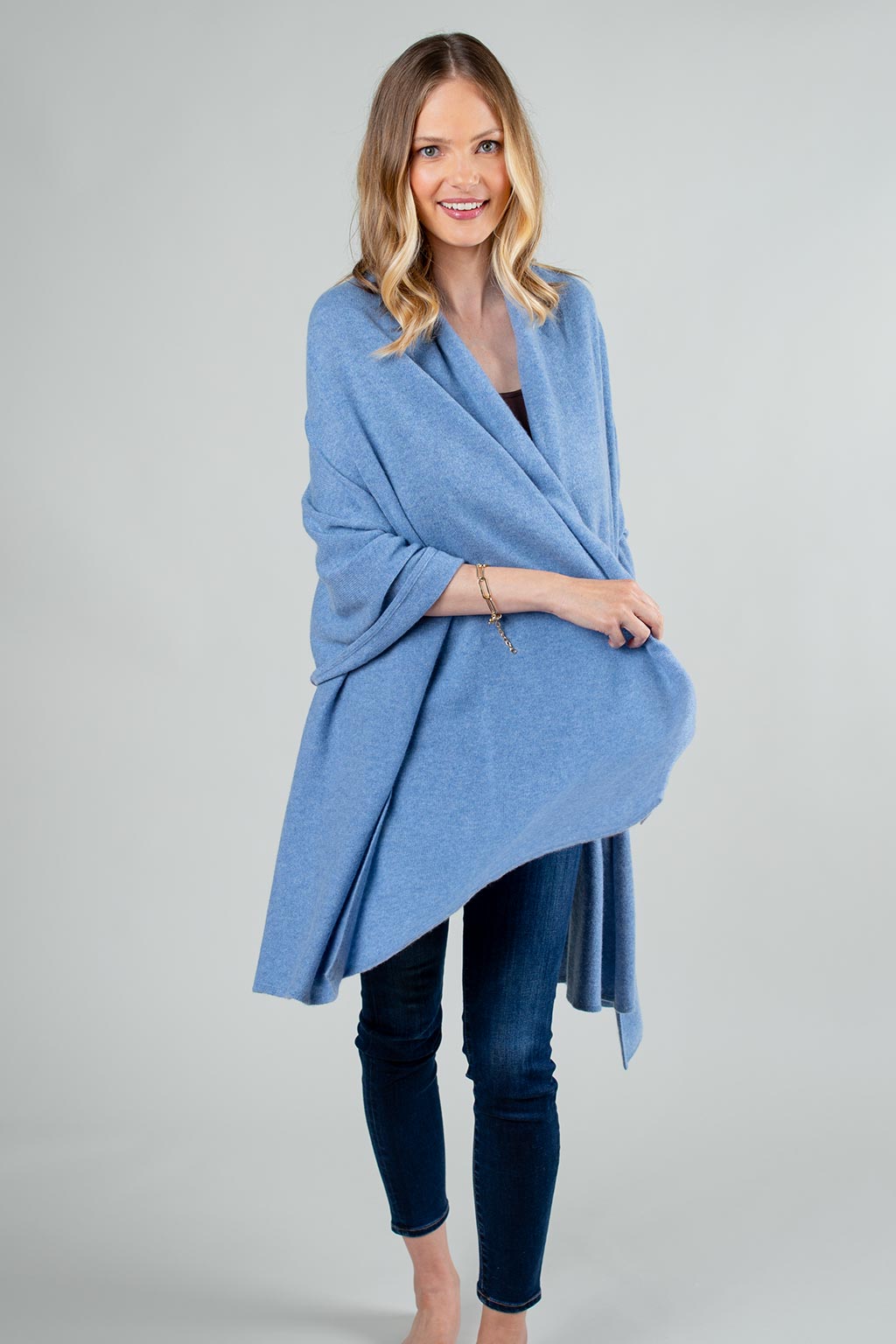 Model Wearing Alpine Cashmere's Luxurious Chunky Travel Wrap in Blue Mist