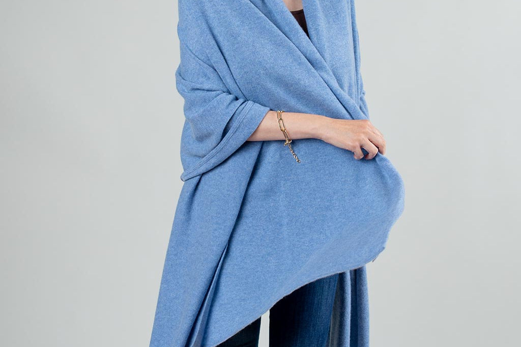 Model Wearing Alpine Cashmere's Luxurious Chunky Travel Wrap in Blue Mist