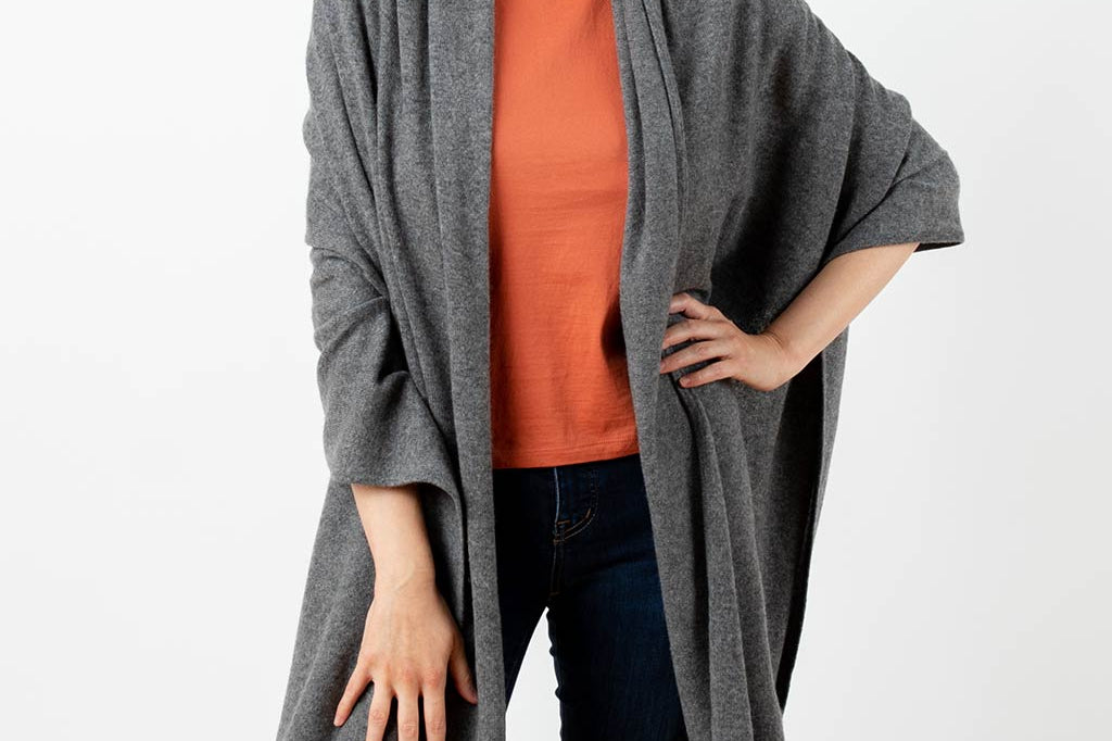 Model Wearing Alpine Cashmere's Luxurious Chunky Travel Wrap in Flannel Gray