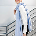 Model Wearing Alpine Cashmere's Luxurious Chunky Travel Wrap in Frost Blue