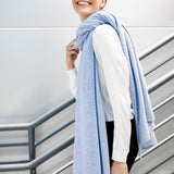 Model Wearing Alpine Cashmere's Luxurious Chunky Travel Wrap in Frost Blue