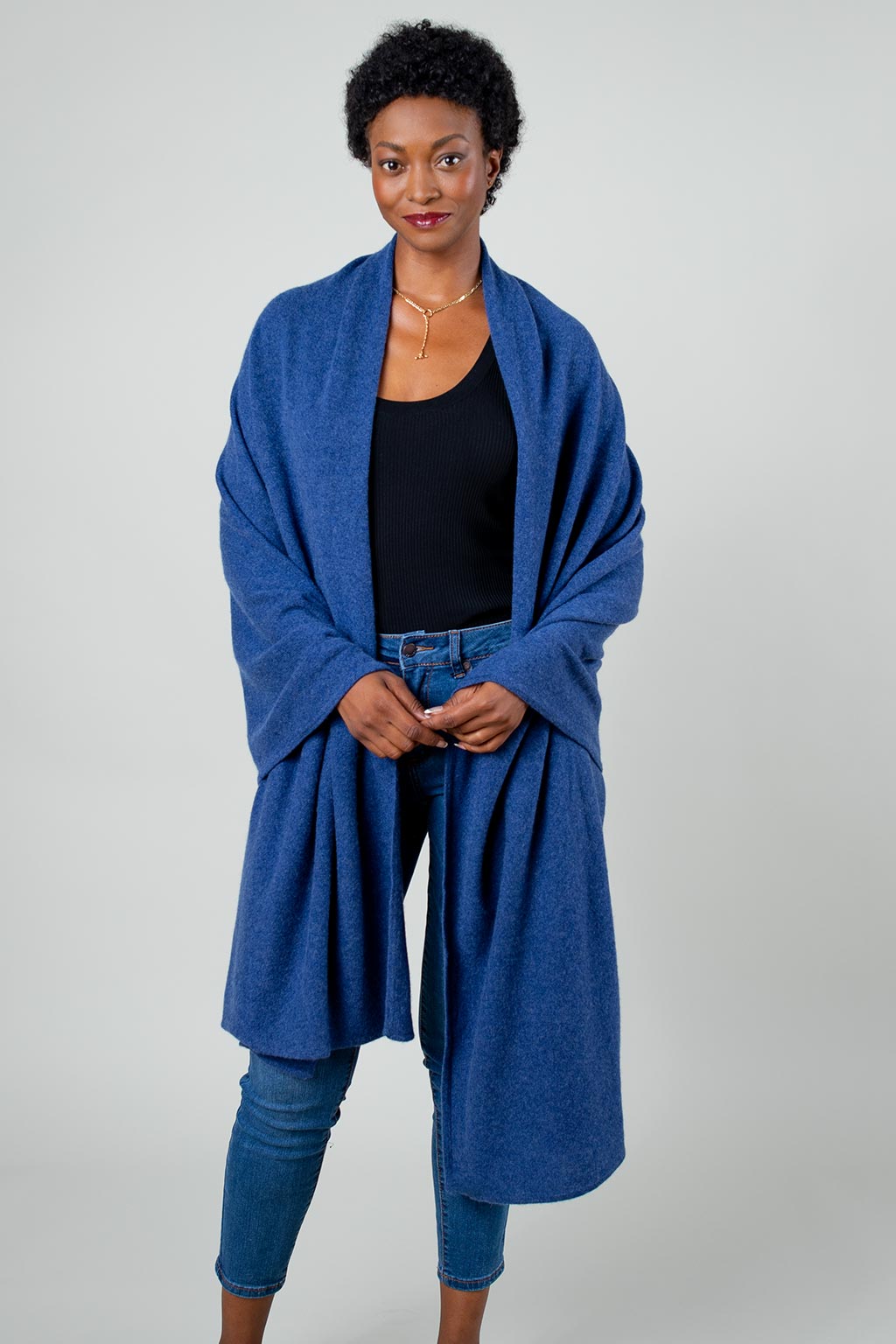 Model Wearing Alpine Cashmere's Luxurious Chunky Travel Wrap in Indigo Blue