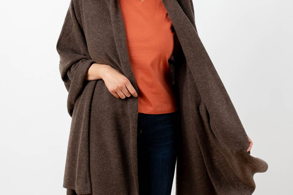 Model Wearing Alpine Cashmere's Luxurious Chunky Travel Wrap in Java Brown
