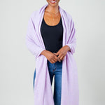 Model Wearing Alpine Cashmere's Luxurious Chunky Travel Wrap in Lilac Purple