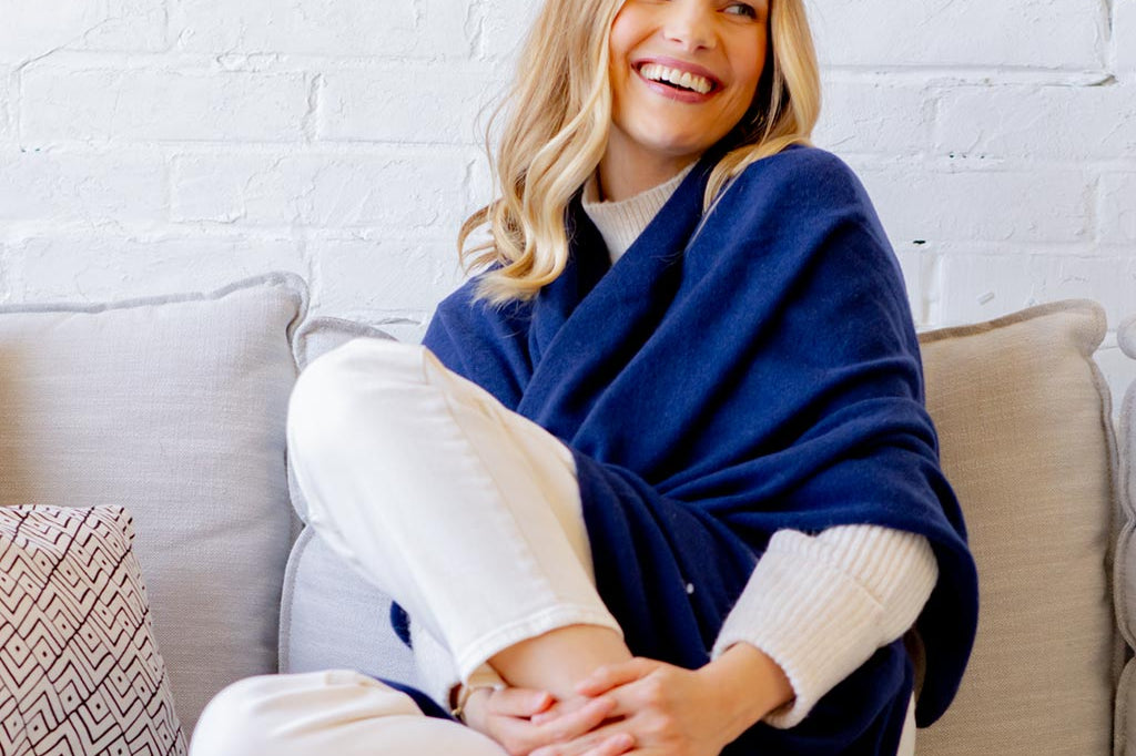 Model Wearing Alpine Cashmere's Luxurious Chunky Travel Wrap in Navy Blue
