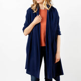 Model Wearing Alpine Cashmere's Luxurious Chunky Travel Wrap in Navy Blue