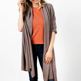 Model Wearing Alpine Cashmere's Luxurious Chunky Travel Wrap in Nutmeg Brown