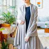 Model Wearing Alpine Cashmere's Luxurious Chunky Travel Wrap in Pewter Gray