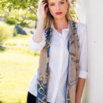 Model Wearing Alpine Cashmere's Featherweight Cinta Scarf in Cornflower Blue and Camel