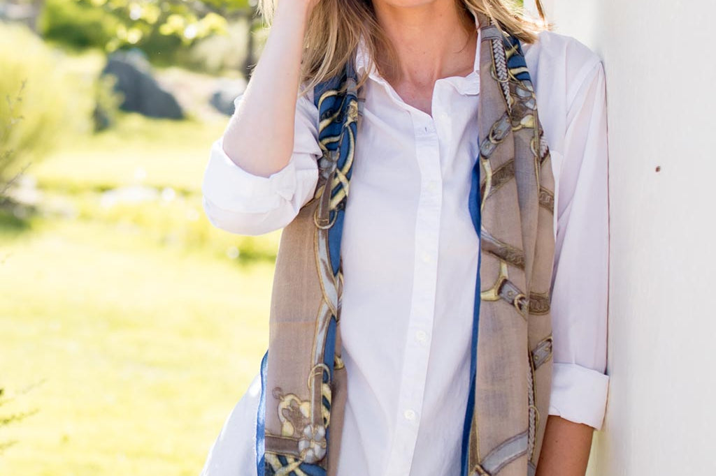 Model Wearing Alpine Cashmere's Featherweight Cinta Scarf in Cornflower Blue and Camel