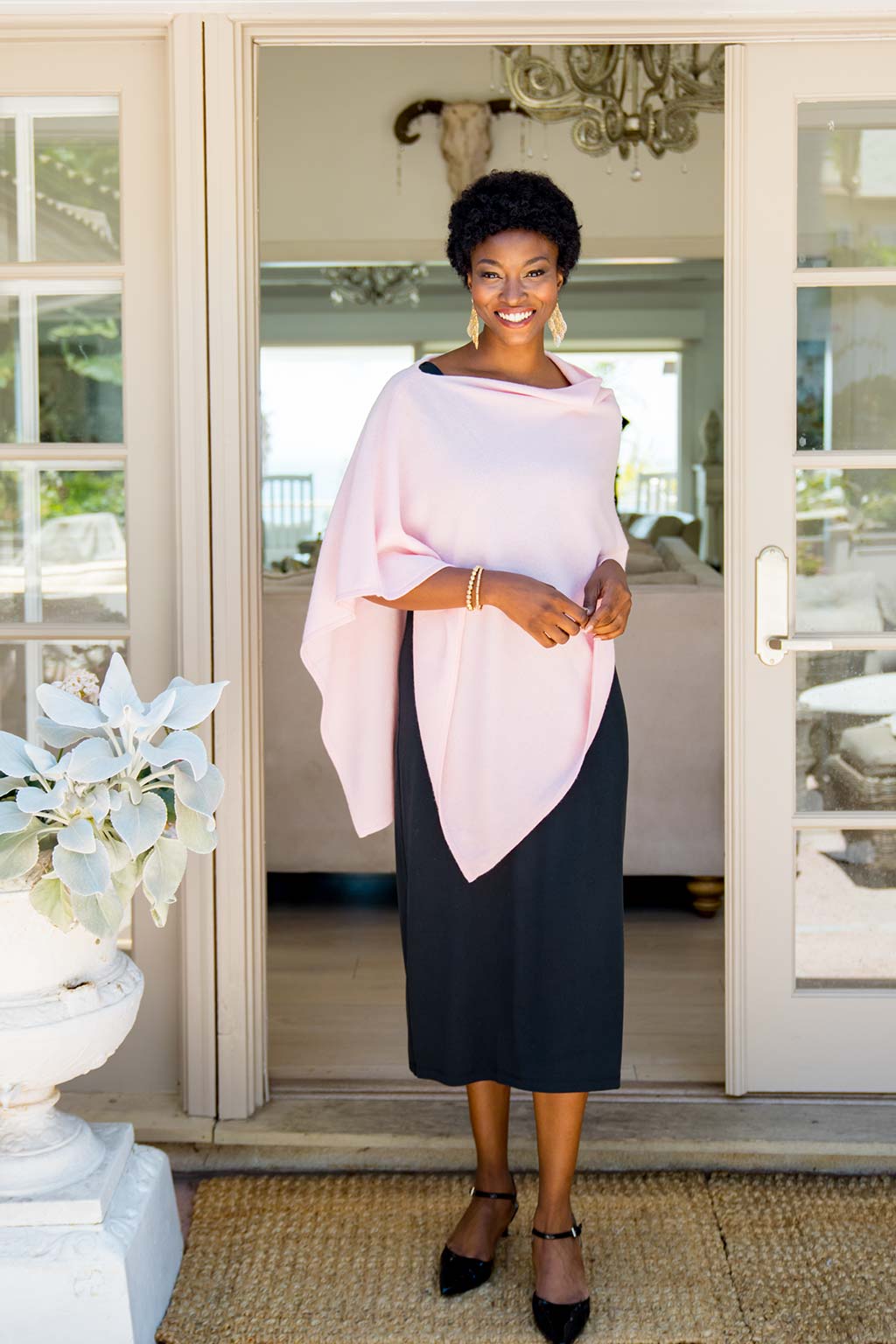 Model Wearing Alpine Cashmere's Classic Poncho in Blush Pink