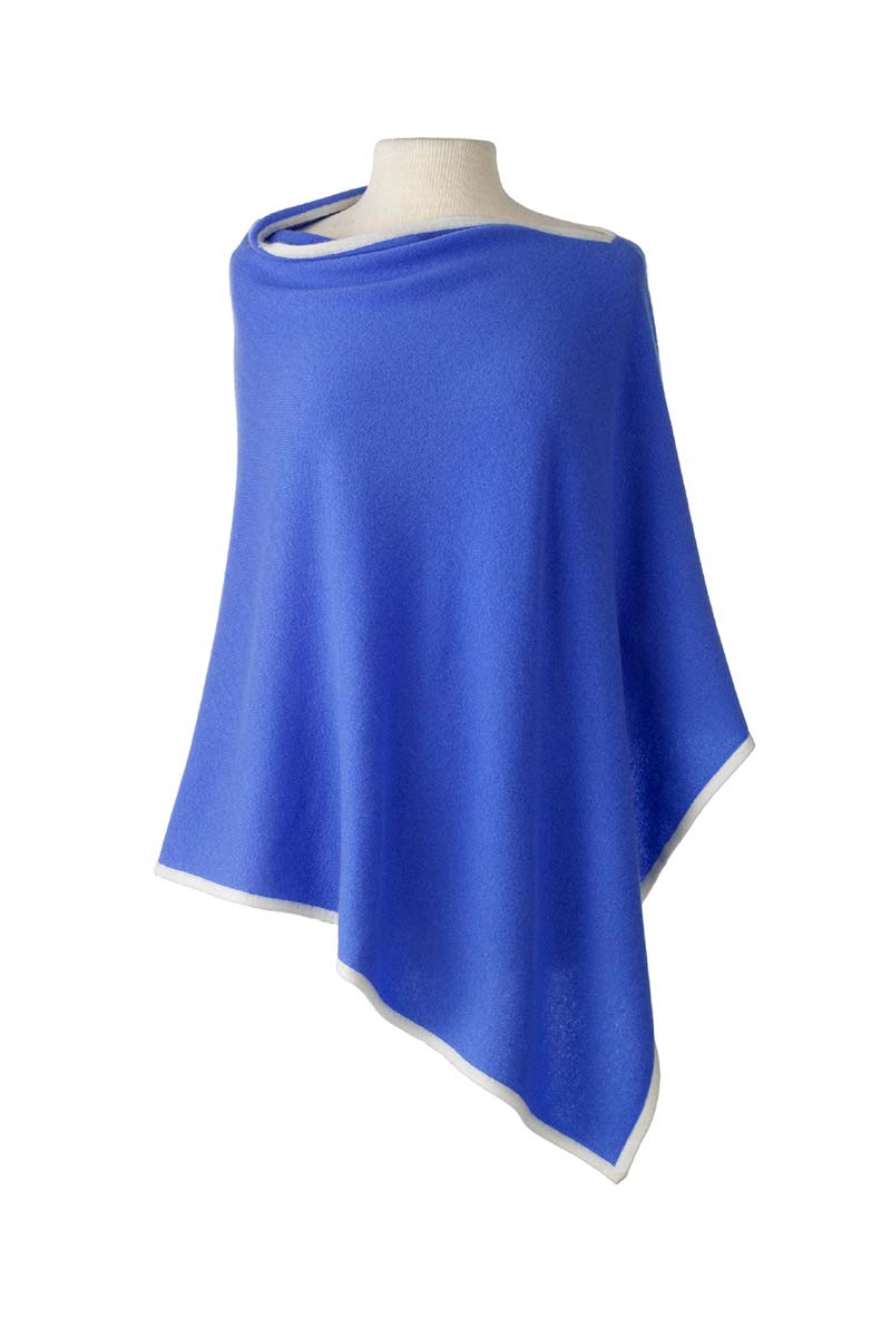 Alpine Cashmere's Classic Poncho in Cornflower Blue with an Ecru Trim