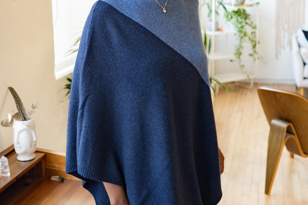 Model Wearing Alpine Cashmere Colorblock Poncho in Denim and Midnight