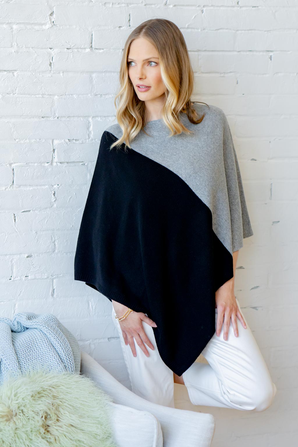Model Wearing Alpine Cashmere Colorblock Poncho in Oxford and Black