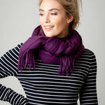 Model Wearing Alpine Cashmere Ripple Finish Wrap in Eggplant Purple