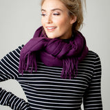 Model Wearing Alpine Cashmere Ripple Finish Wrap in Eggplant Purple