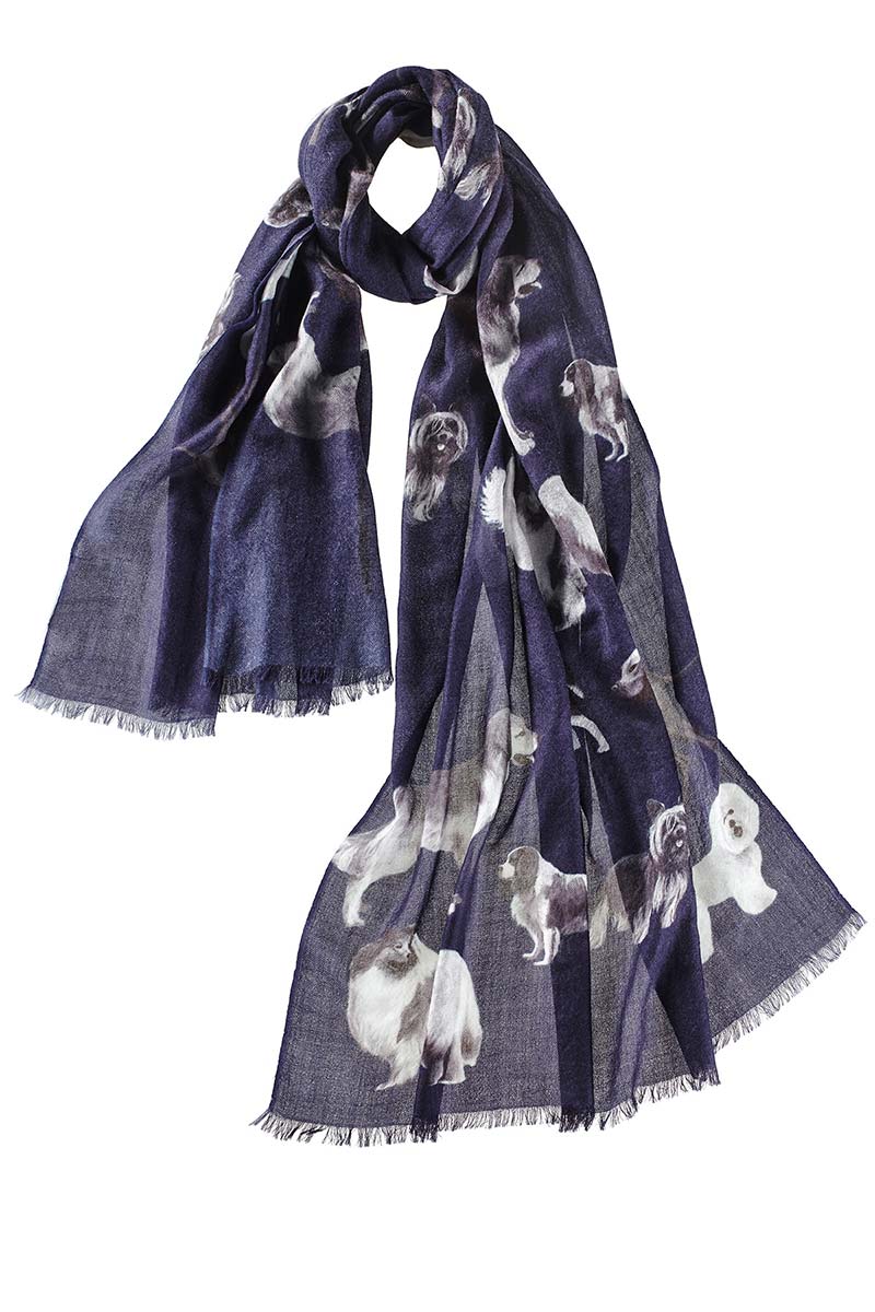 Alpine Cashmere's Dog's Life Scarf, featuring an illustrated print of dogs, in navy blue