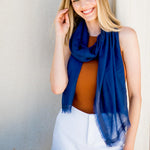 Model Wearing Alpine Cashmere's Featherweight Finezza Scarf in Navy Blue