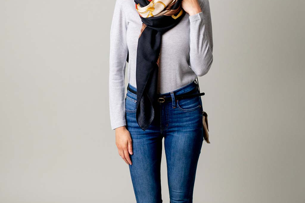 Model Wearing Alpine Cashmere's Grande Siena Scarf in Cream Made in Italy