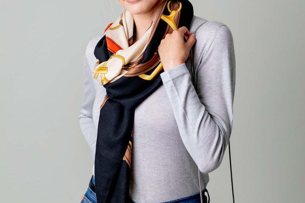 Model Wearing Alpine Cashmere's Grande Siena Scarf in Cream Made in Italy