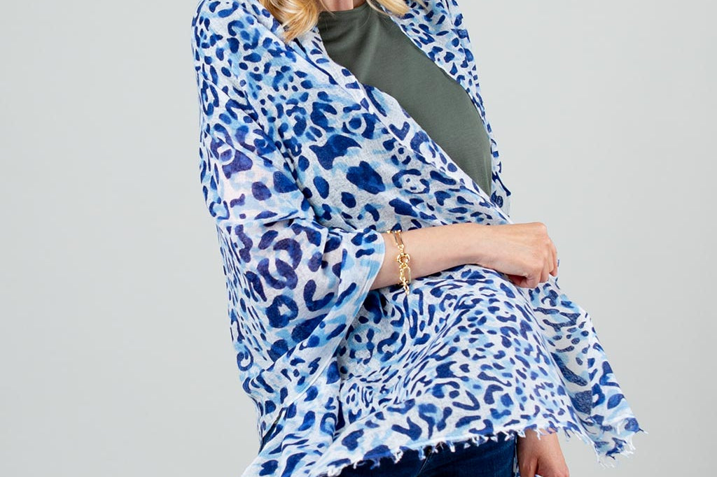 Model Wearing Alpine Cashmere's Leopard Scarf in Navy Blue