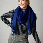 Model Wearing Alpine Cashmere Ripple Finish Wrap in Navy Blue