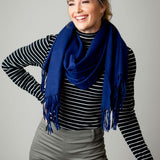 Model Wearing Alpine Cashmere Ripple Finish Wrap in Navy Blue