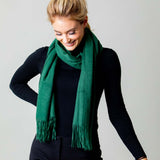 Model Wearing Alpine Cashmere Ripple Finish Scarf in Pine Green
