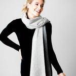 Model Wearing Alpine Cashmere Ripple Finish Reversible Wrap in Smoke and Ash Gray