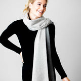 Model Wearing Alpine Cashmere Ripple Finish Reversible Wrap in Smoke and Ash Gray