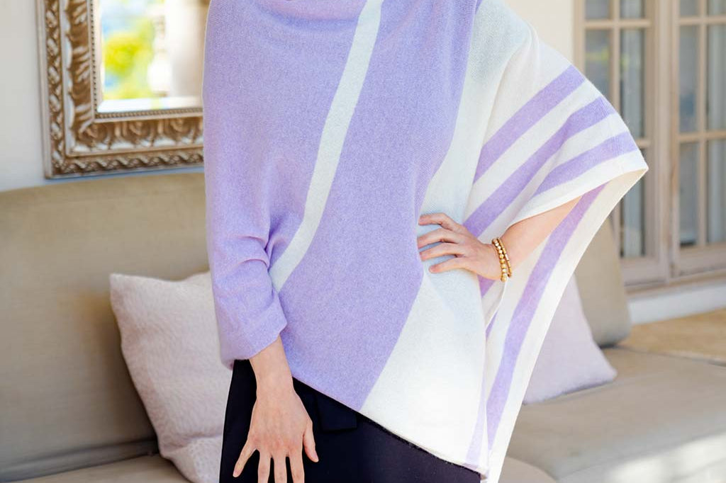 Model Wearing Alpine Cashmere Striped Poncho in Lilac and Ecru