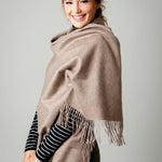 Model Wearing Alpine Cashmere Ripple Finish Wrap in Taupe