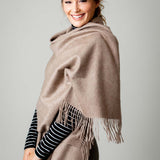 Model Wearing Alpine Cashmere Ripple Finish Wrap in Taupe