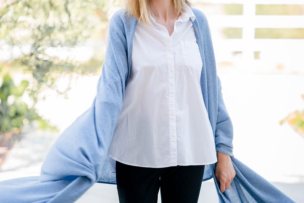 Model Wearing Alpine Cashmere's Luxurious Chunky Travel Wrap in Blue Mist