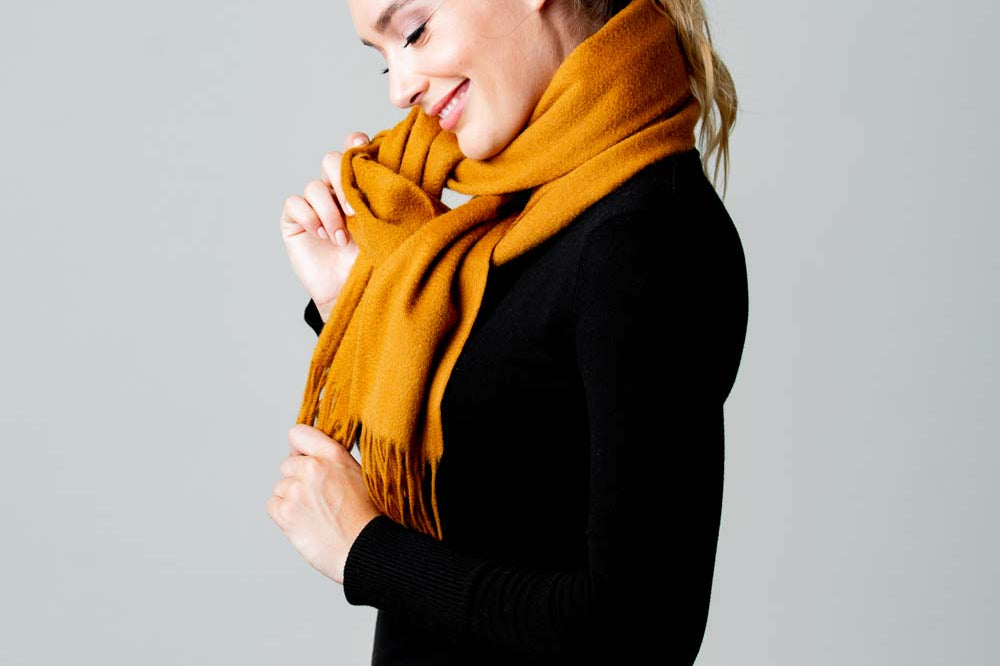 Model Wearing Alpine Cashmere Ripple Finish Scarf in Vicuna