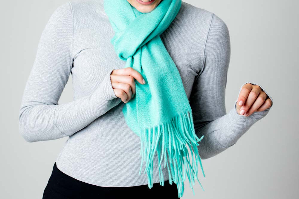 Model Wearing Alpine Cashmere Ripple Finish Scarf in Aqua