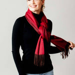 Model Wearing Alpine Cashmere Ripple Finish Reversible Wrap in Burgundy and Crimson