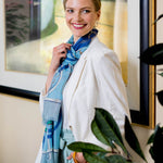 Model Wearing Alpine Cashmere Featherweight Printed Cashmere Verona Scarf in Turquoise Blue